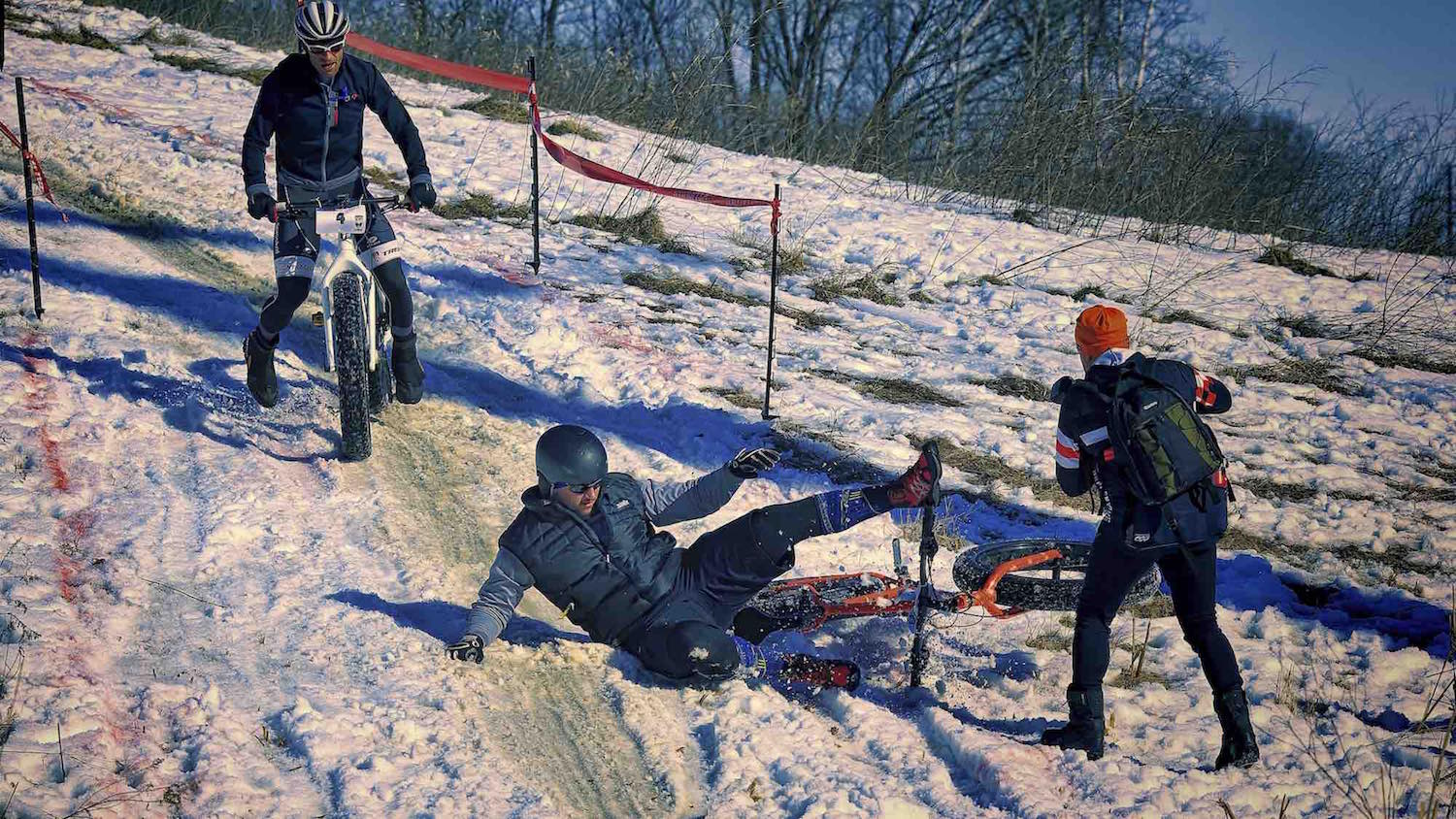 A rider crashes his fat bike during the Fat Cupid Classic.