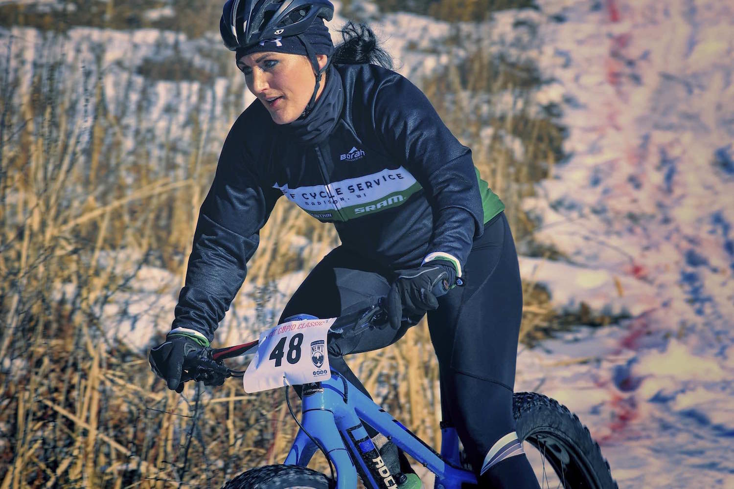 A racer concentrates on accelerating out of a corner on her Fat Bike during the Fat Cupid for 2017.